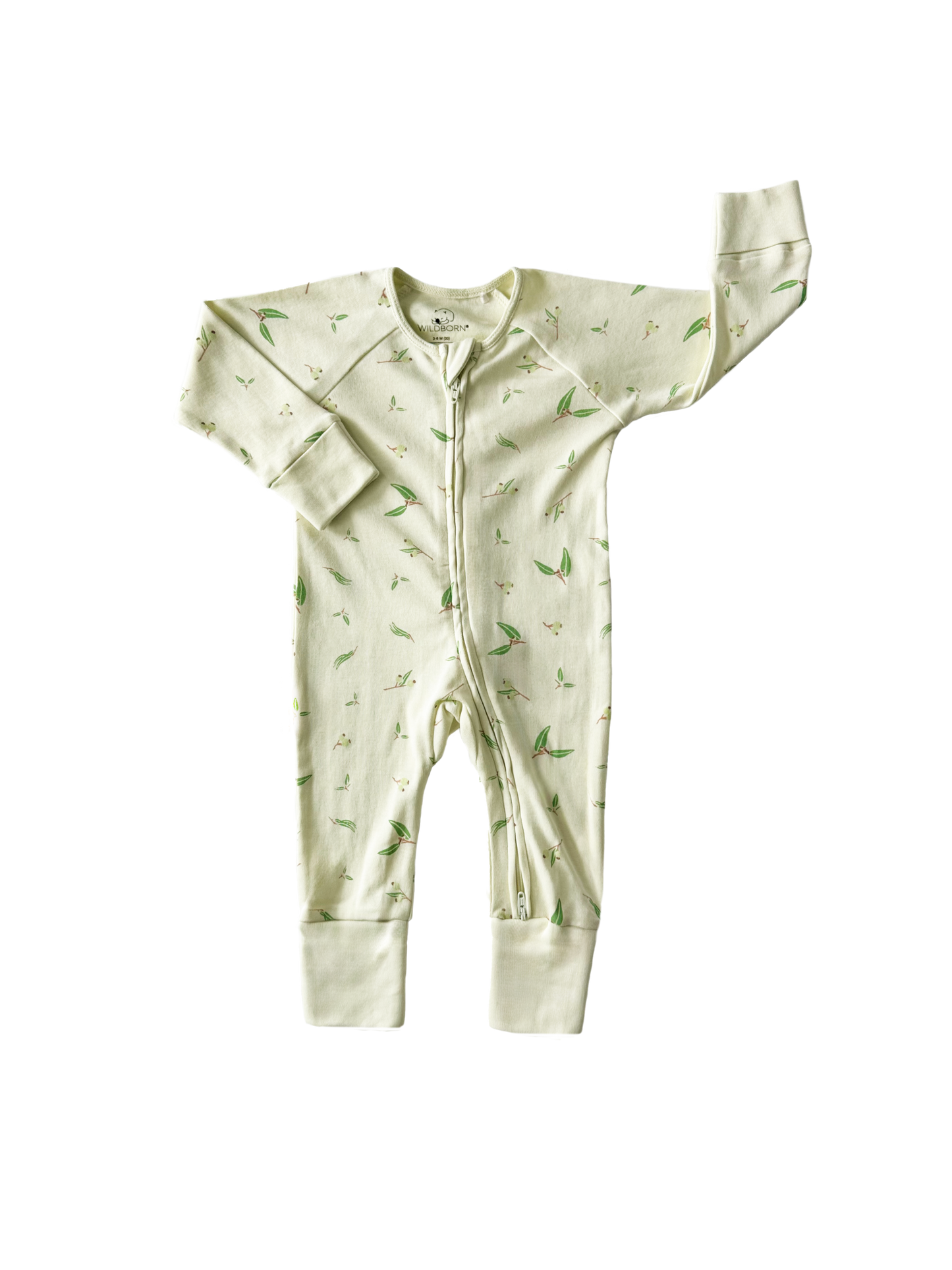 Green baby onesie with a pattern on a white background