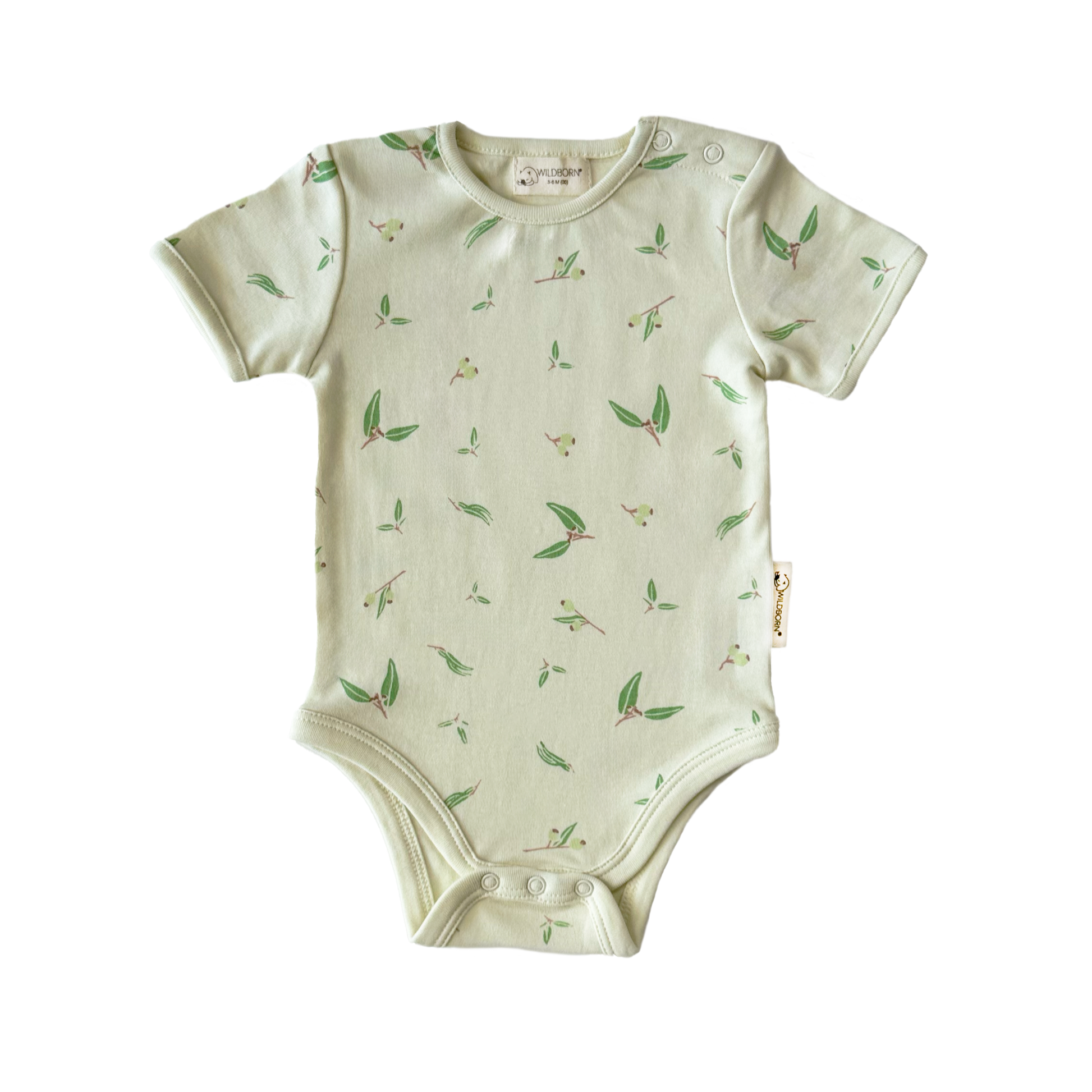 Baby onesie with green leaf pattern on a white background