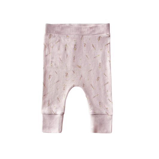 Baby leggings with subtle pattern on a white background