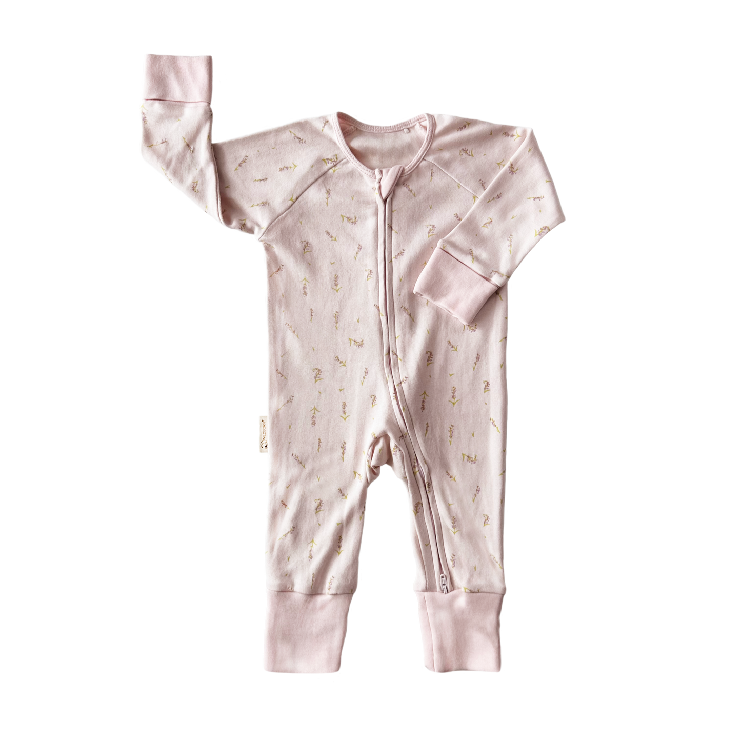 Pink baby onesie with a zipper on a white background