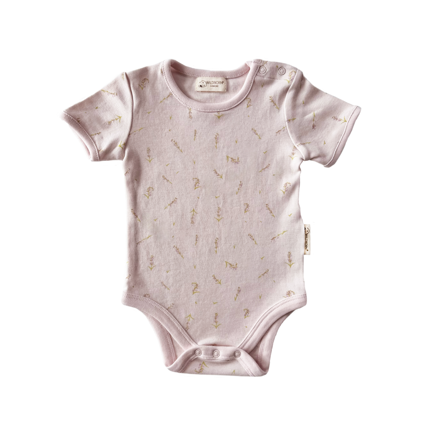 Baby onesie with subtle pattern
