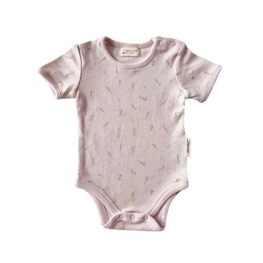 Baby onesie with subtle pattern