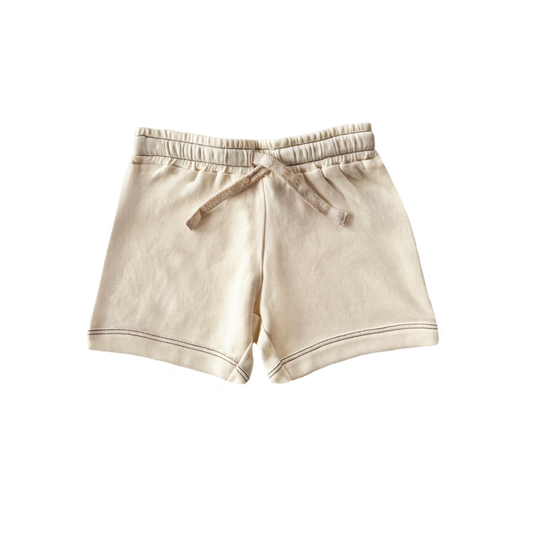 Beige shorts with a drawstring on a white background