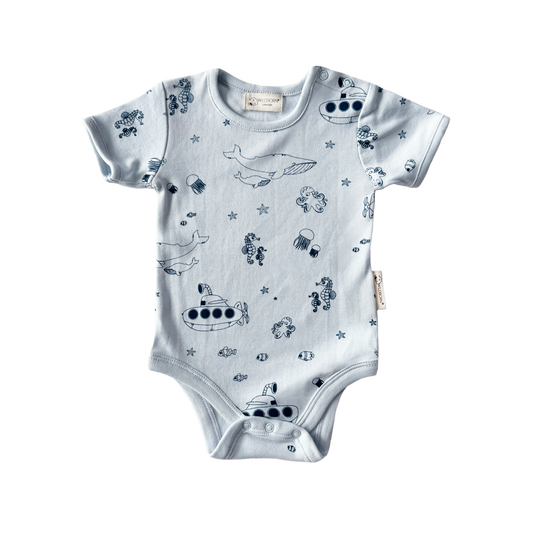 Baby onesie with under the sea-themed print