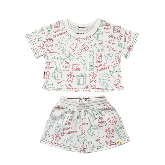 Children's Christmas-themed outfit with top and shorts on a white background